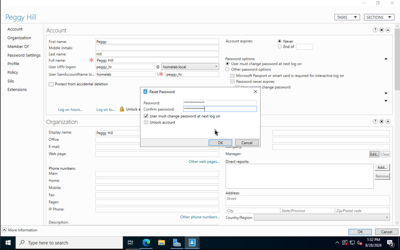 Reset Password dialog for Peggy Hill with User must change password at next log on checked